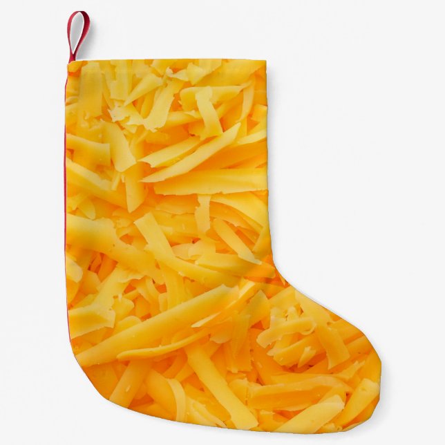 grated cheddar cheese top view small christmas stocking (Front)
