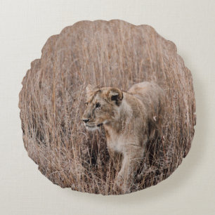 GRAY AND BROWN LION SURROUNDED BY BROWN GRASS ROUND PILLOW