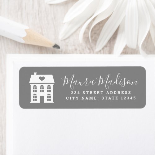 Gray and white town house and heart return label