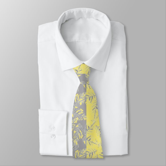Gray and yellow leaves on a striped background.  neck tie (Tied)