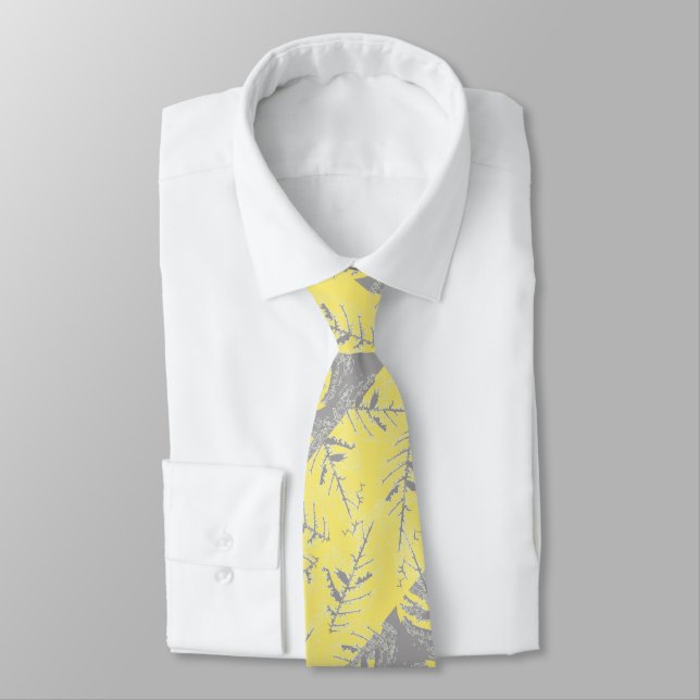 Gray and yellow leaves on a striped background.  neck tie (Tied)