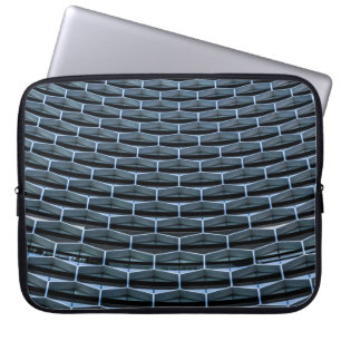 Gray building under clear blue sky laptop sleeve