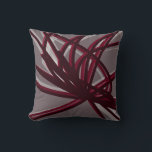 Gray & Burgundy Artistic Abstract Ribbons Throw Pillow<br><div class="desc">Gray and burgundy throw pillow features an artistic abstract ribbon composition with shades of burgundy and grey with white accents on a gray background. This abstract composition is built on combinations of repeated ribbons, which are overlapped and interlaced to form an intricate and complex abstract pattern. The gray, burgundy, white...</div>