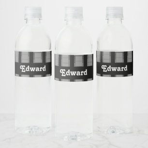 Gray camera film on black water bottle label