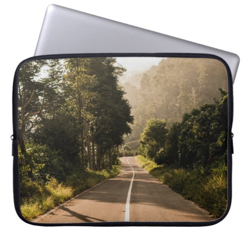 Gray concrete road in the morning laptop sleeve