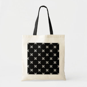 Gray cross stitches on black tote bag