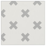 Gray cross stitches on white fabric