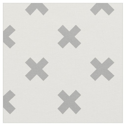 Gray cross stitches on white fabric