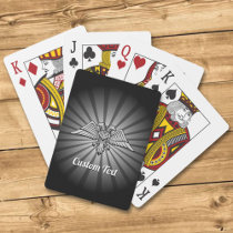 Gray eagle with two heads playing cards
