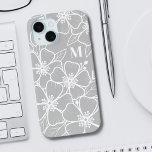 Gray Floral Monogram iPhone 15 Case<br><div class="desc">Girly Chic Gray Floral Monogram Initial iPhone 15 Case. A fun but elegant phone case with girly gray and white flower outlines. A playful flower pattern frames a chic serif font simple initial monogram. The fun part is you can change out ALL of the colors!! You can not only change...</div>