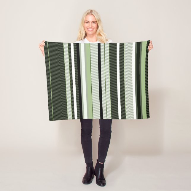 Gray, green, white stripes.  fleece blanket (In Situ)