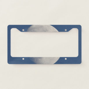 Gray moon in blue sky license plate frame