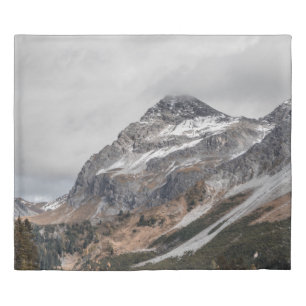 GRAY MOUNTAINS WITH SNOW CAPPED SURROUNDED WITH TR DUVET COVER