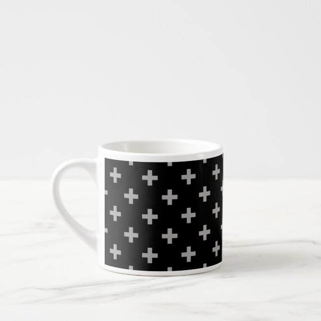 Gray polka crosses on black espresso cup (Left)