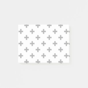 Gray polka crosses on white post-it notes