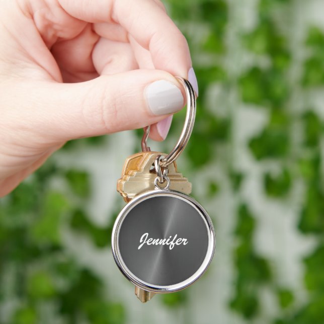 Gray shiny faux metal custom name keychain (Hand)