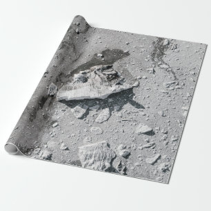 Gray stones on gray dirt wrapping paper