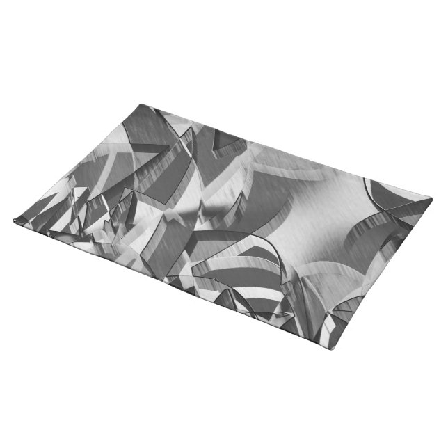 Gray streaks on some black, drizzled image cloth placemat (On Table)