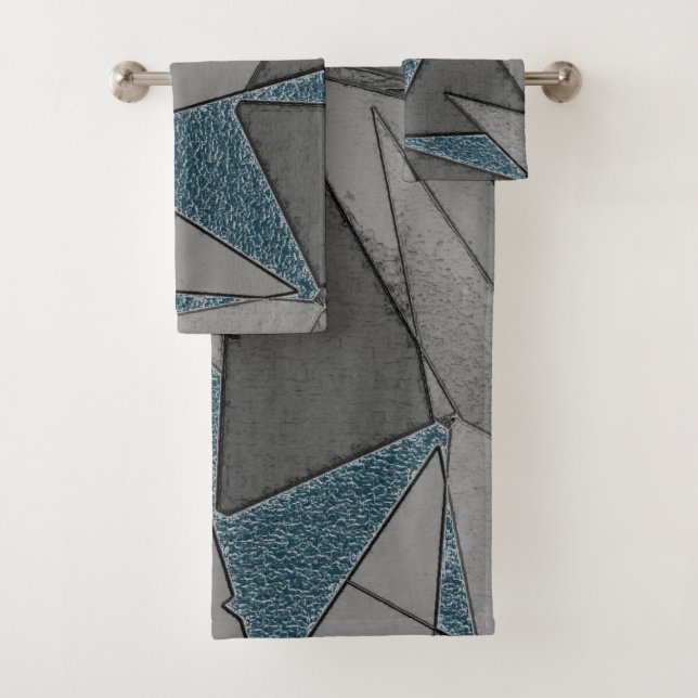 Gray triangle cutouts with rough dark blue pieces bath towel set (Insitu)