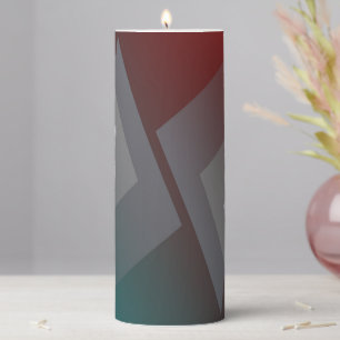 Gray triangles on teal burgundy pillar candle
