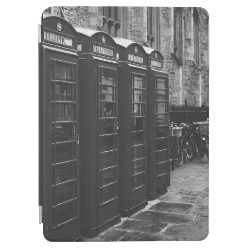 GRAYSCALE PHOTO OF FOUR TELEPHONE BOOTHS LINED UP iPad AIR COVER