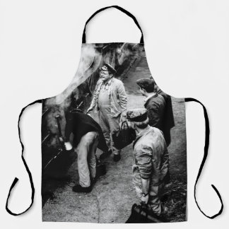 GRAYSCALE PHOTO OF MEN STANDING BESIDE 60163 TRAIN APRON