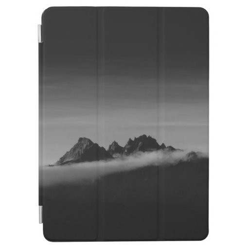 GRAYSCALE PHOTO OF MOUNTAIN COVERED WITH CLOUDS iPad AIR COVER