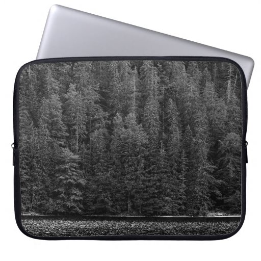 GRAYSCALE PHOTO OF TREES NEAR RIVER LAPTOP SLEEVE