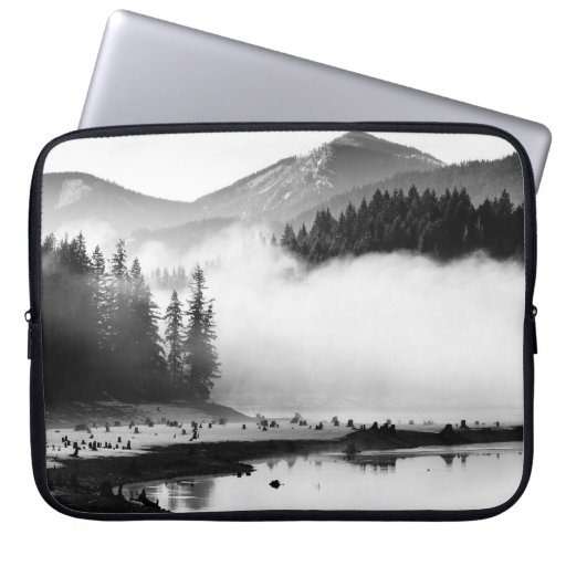 GRAYSCALE PHOTOGRAPHY OF LAKE NEAR PINE TREES LAPTOP SLEEVE