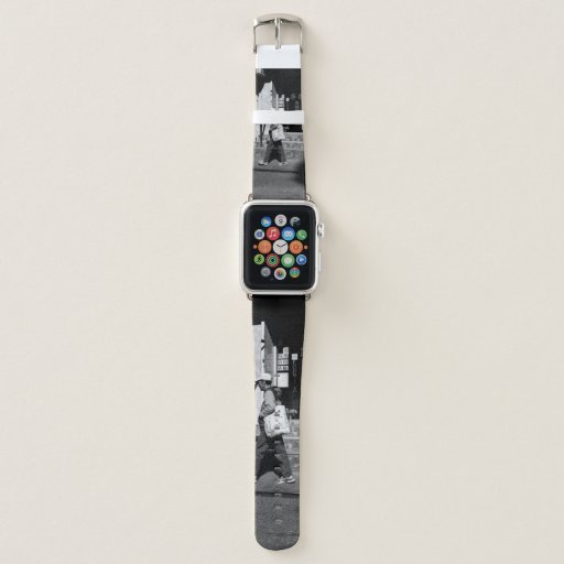 GRAYSCALE PHOTOGRAPHY OF PERSON WALKING BESIDE BUI APPLE WATCH BAND