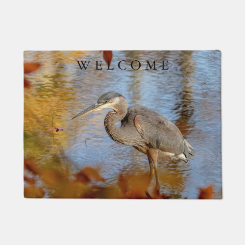 Great Blue Heron framed with fall foliage Doormat