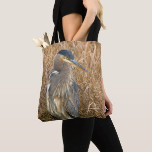 Great Blue Heron in a Field of Golden Reeds Tote Bag