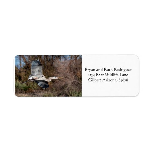 Great blue heron in flight label