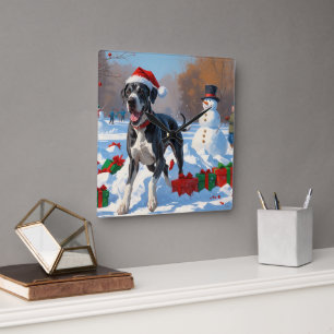 Great Dane Running in Snow with Christmas Hat Square Wall Clock