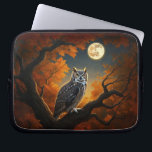 Great Horned Owl in Autumn Laptop Sleeve<br><div class="desc">A great horned owl in a tree in autumn under the light of a full moon.</div>