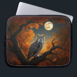 Great Horned Owl in Autumn Laptop Sleeve<br><div class="desc">A great horned owl in a tree in autumn under the light of a full moon.</div>