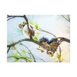 Great Horned Owlets Looking From Branch Fine Art Canvas Print