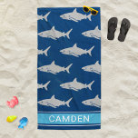 Great White Sharks Navy Blue Custom Name Beach Towel<br><div class="desc">Ferociously cool personalized beach towel design features a nautical navy blue background with an ocean pattern of gray colored great white sharks. Add a first or last name to the modern all caps custom text space with a simple bright blue striped frame.</div>