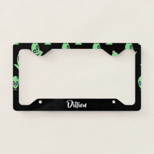 Green alien heads on black license plate frame