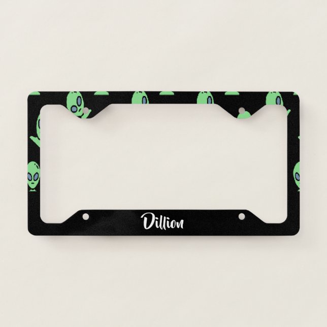 Green alien heads on black license plate frame (Front)