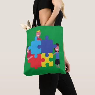 Green allover print autism puzzle tote pillow.