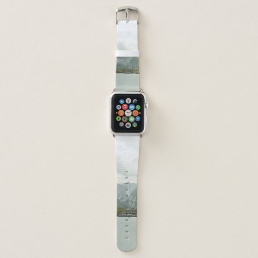 GREEN AND BROWN MOUNTAINS NEAR BODY OF WATER UNDER APPLE WATCH BAND