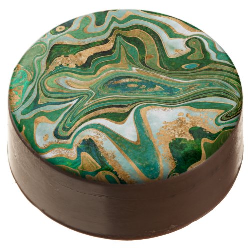 Green and gold liquid marble abstract chocolate covered oreo