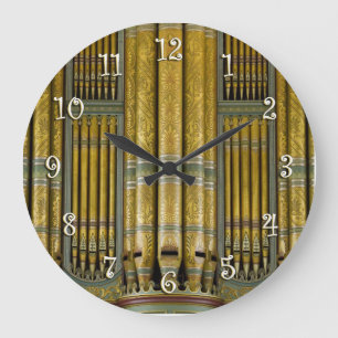 Green and gold organ pipes round clock