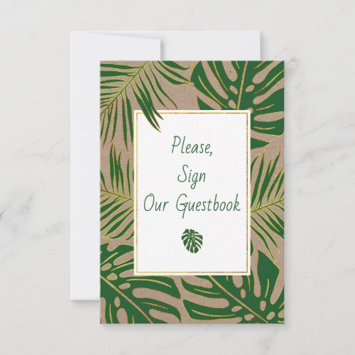 Green and gold tropical leaves sign our guest book invitation