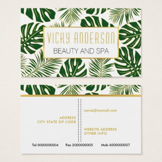 Green and gold tropical monstera and palm leaves