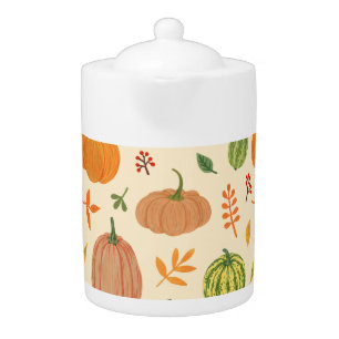Green and orange pumpkins, seamless pattern. teapot
