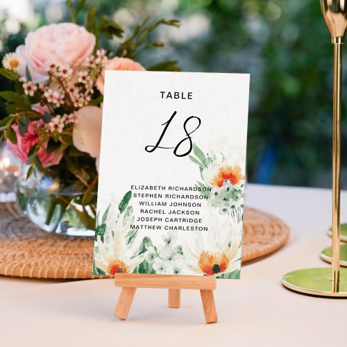 Green and orange wildflowers guests names table number