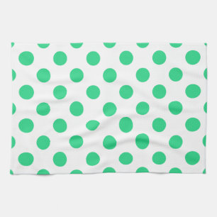 Green and white polka dots towel