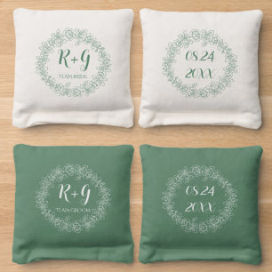 Green and white rose wreath with initials wedding cornhole bags